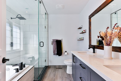 A well-organized bathroom with tile flooring